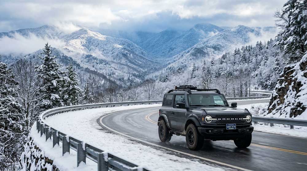 Used SUV navigating a snowy mountain road in the Appalachians — 4WD SUV Bristol TN Fast Track Automotive July 2026
